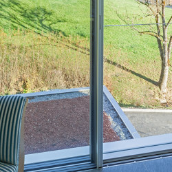 Frameless sliding windows with all-glass safety barrier | Window types | swissFineLine